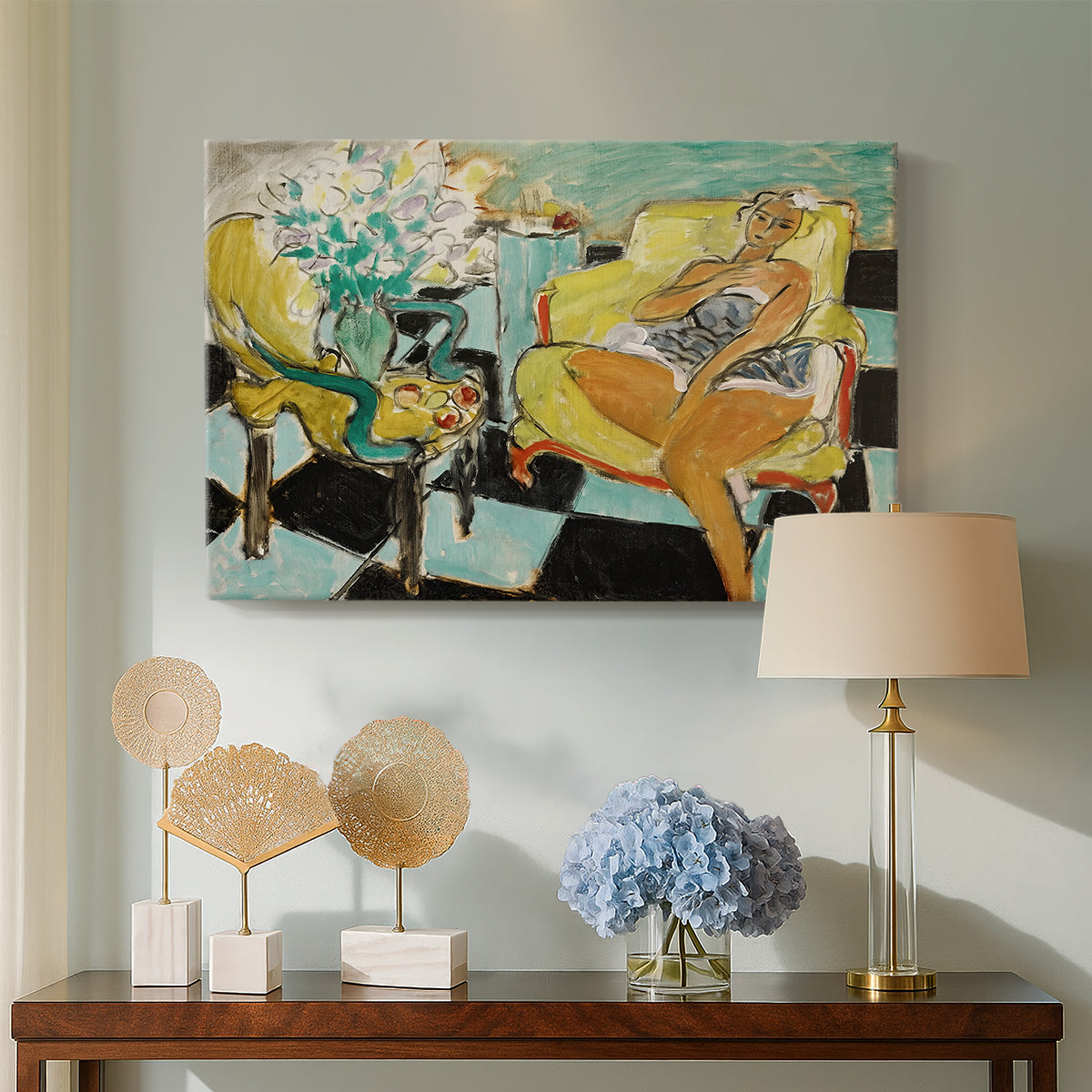 Canvas art print featuring a stylized woman in bold colors against a decorative background, displayed above a styled console table