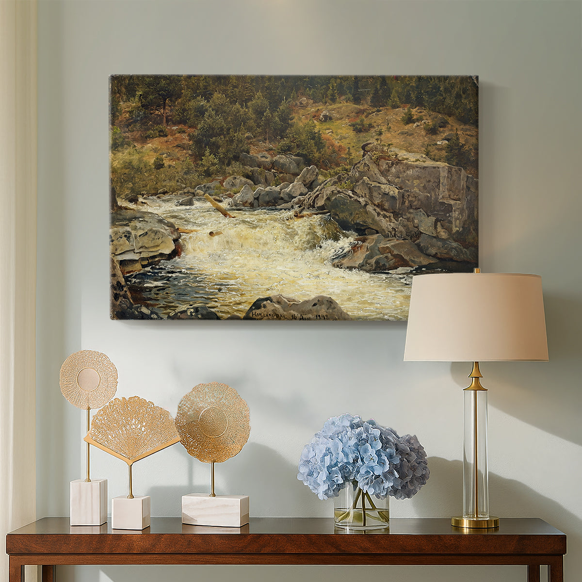 Canvas art print featuring a landscape focused on vertical movement of waterfall, displayed above a styled console table