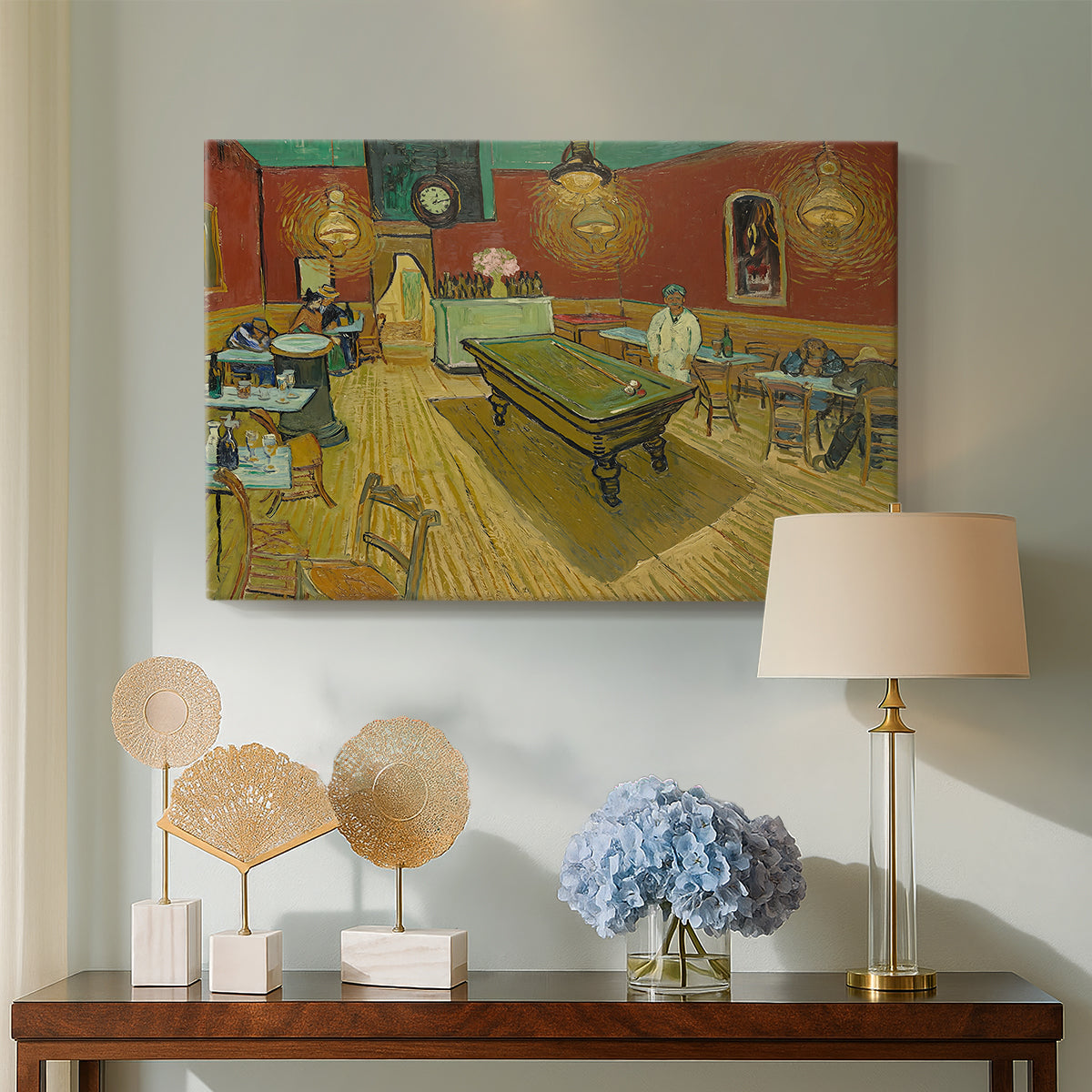 Canvas art print featuring a post-impressionist café setting with vivid color contrast and empty tables, displayed above a styled console table