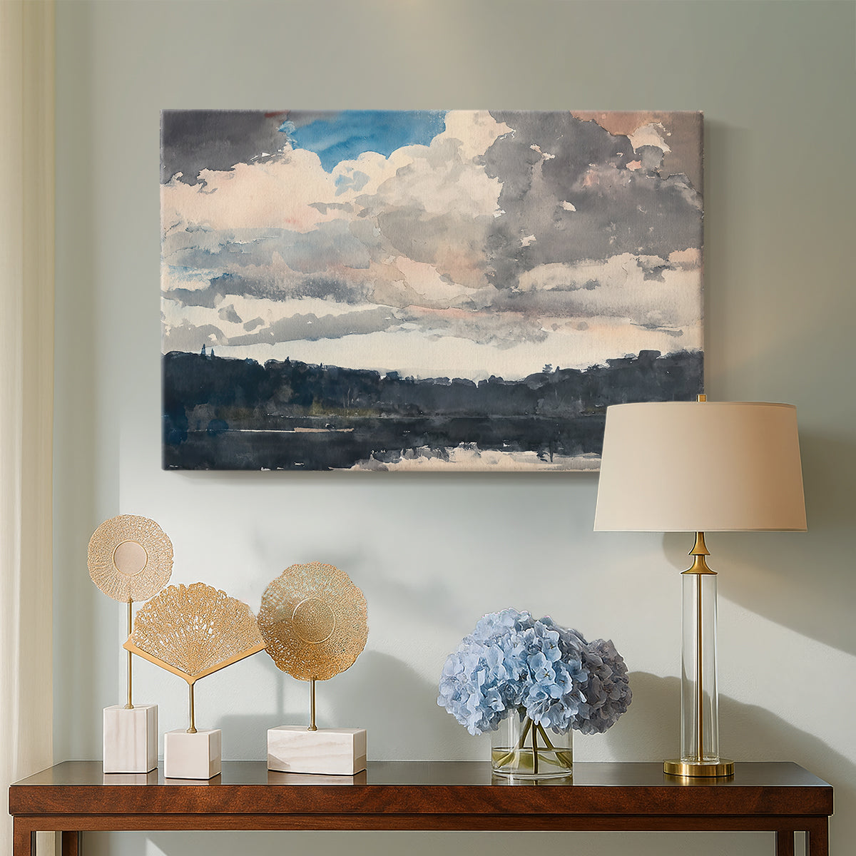 Canvas art print featuring a calm lake composition with trees reflected in water, displayed above a styled console table
