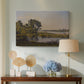 Canvas art print featuring a tranquil natural setting with river and distant horizon, displayed above a styled console table