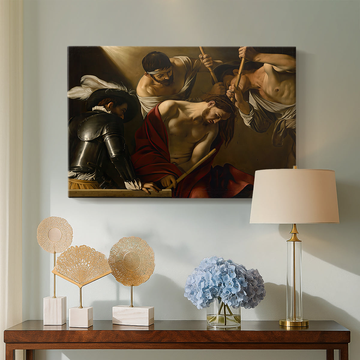 Canvas art print featuring a dramatic depiction of figures forcing thorn crown onto Christ, displayed above a styled console table