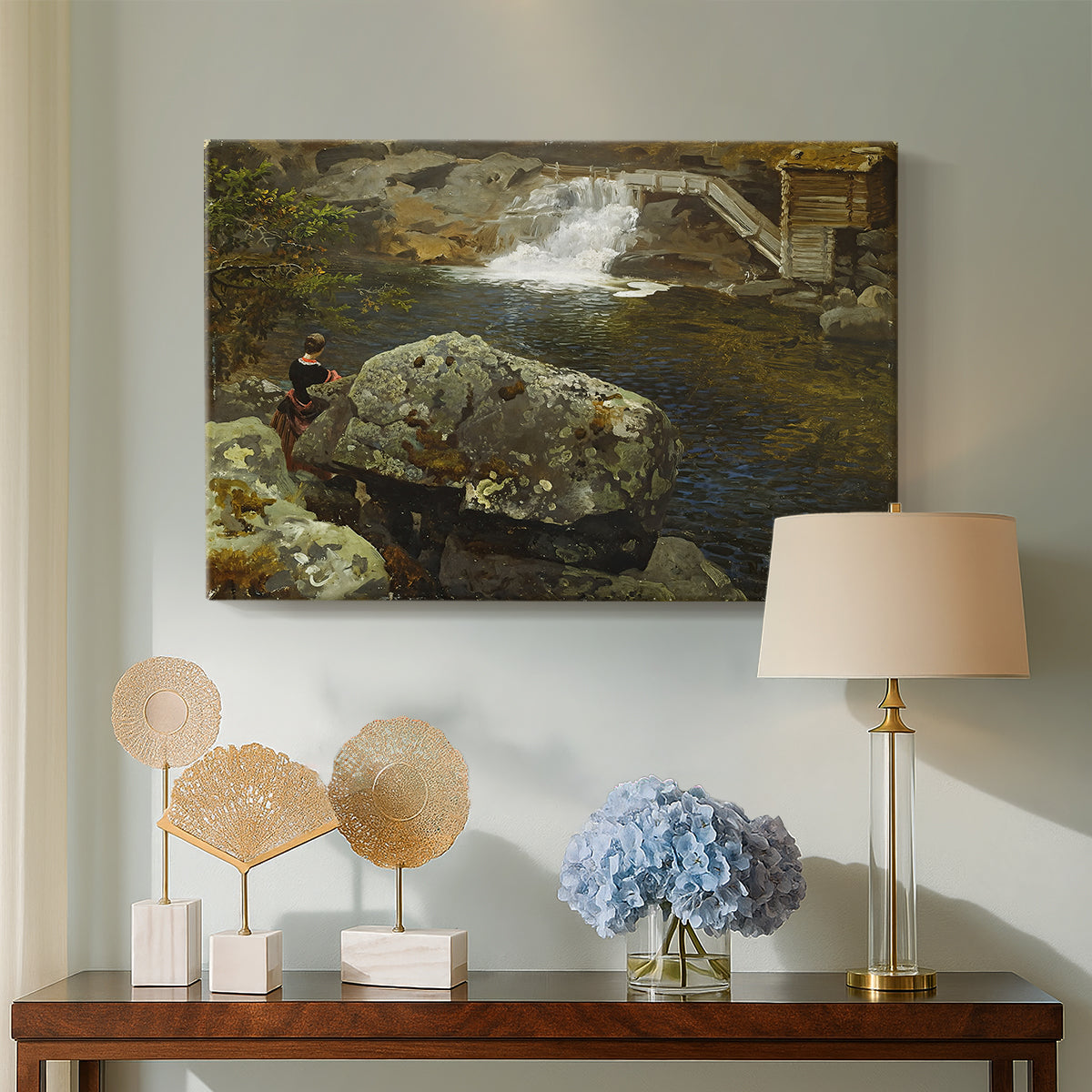 Canvas art print featuring a countryside pond with foliage and reflective surface, displayed above a styled console table