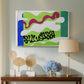 Canvas art print featuring an expressive abstract work with organic lines, displayed above a styled console table