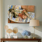 Canvas art print featuring a stylized reclining female figure in an ornate interior, displayed above a styled console table