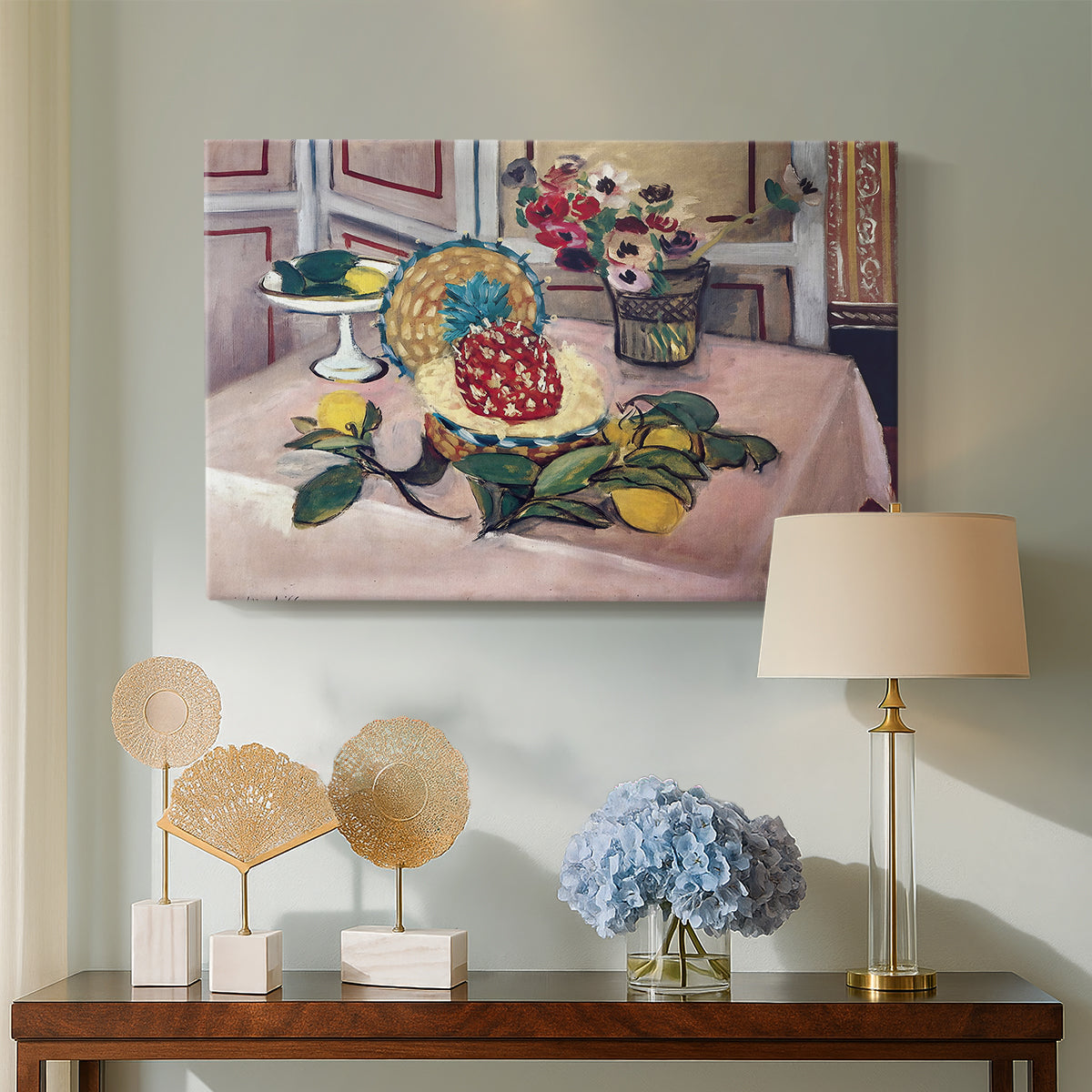 Canvas art print featuring a colorful still life with fruit and surrounding objects, displayed above a styled console table