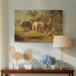 Canvas art print featuring a countryside composition showing livestock during feeding, displayed above a styled console table