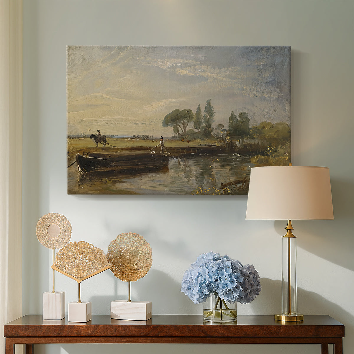 Canvas art print featuring a pastoral landscape featuring canal, displayed above a styled console table