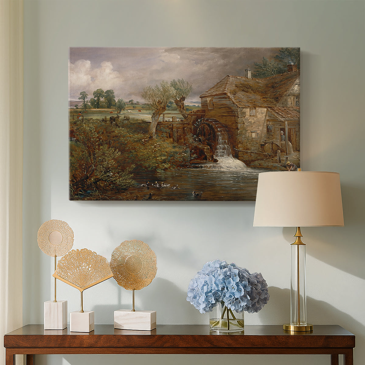 Canvas art print featuring an architectural landscape with rustic building, displayed above a styled console table