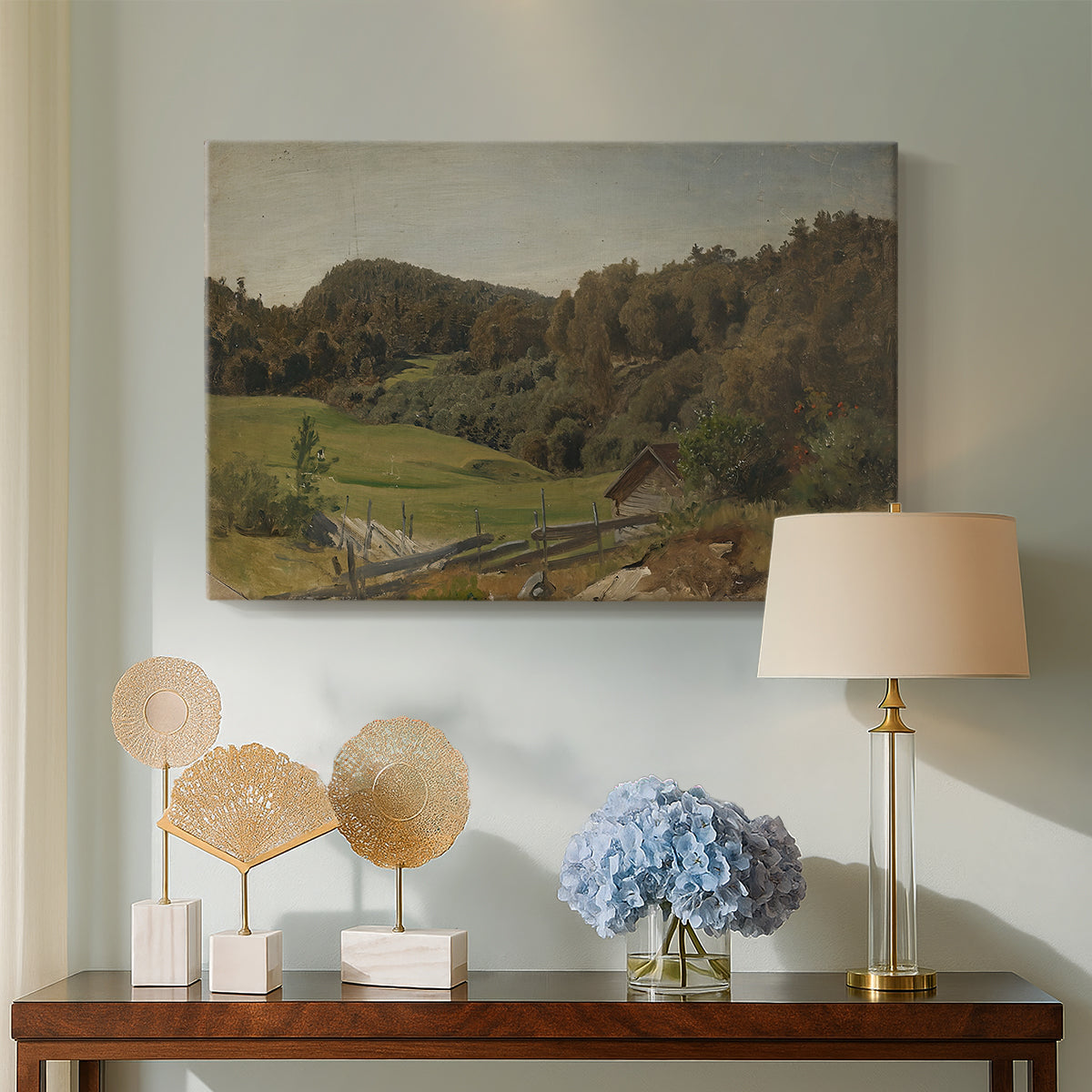 Canvas art print featuring a scenic rural landscape with fields and horizon, displayed above a styled console table