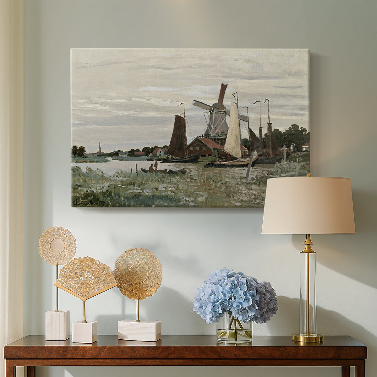 Canvas art print featuring a rustic scene with windmill and reflections in water, displayed above a styled console table