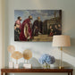Canvas art print featuring a Renaissance family composition centered on ritual veneration, displayed above a styled console table
