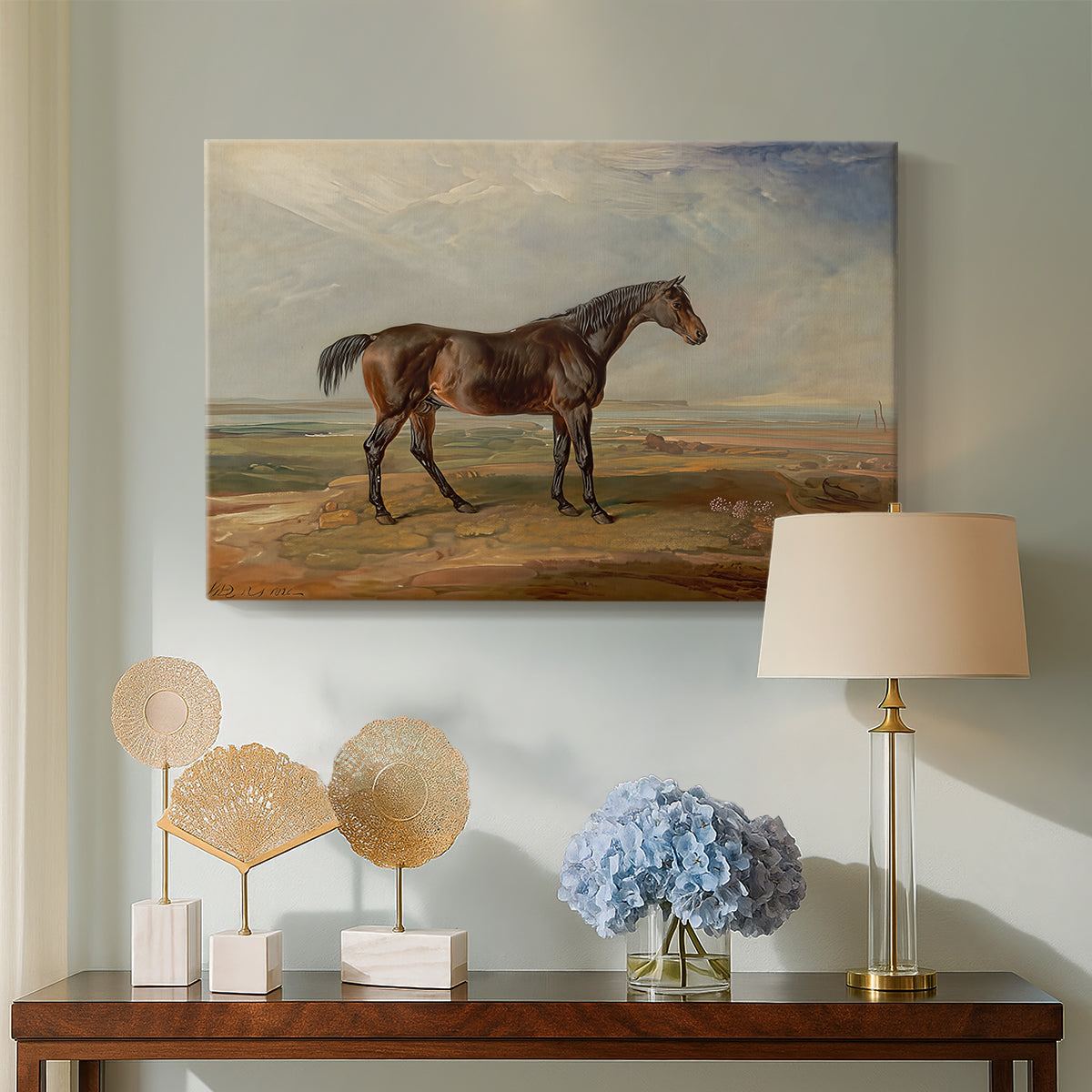 Canvas art print featuring a realistic depiction of horse in seaside terrain, displayed above a styled console table