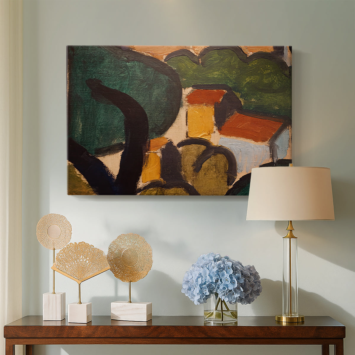 Canvas art print featuring a Fauvist landscape of trees and houses in abstracted form, displayed above a styled console table