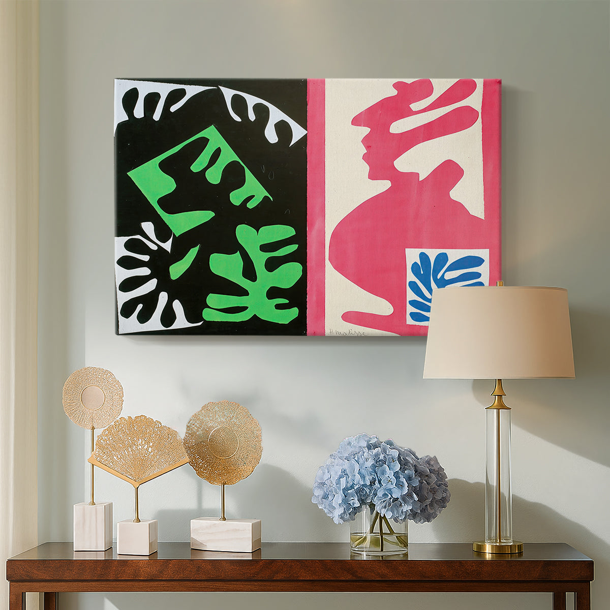 Canvas art print featuring a geometric abstraction using limited color palette, displayed above a styled console table