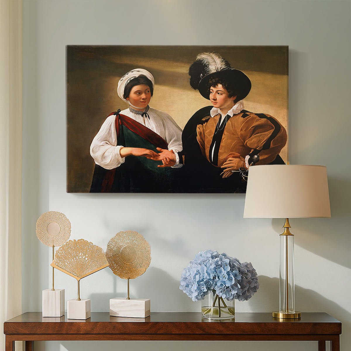 Canvas art print featuring an intimate scene of palm reading with subtle act of theft, displayed above a styled console table