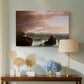 Canvas art print featuring a romantic coastal composition with shifting weather, displayed above a styled console table