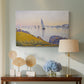 Canvas art print featuring a pointillist sunset harbor with calm sea, displayed above a styled console table