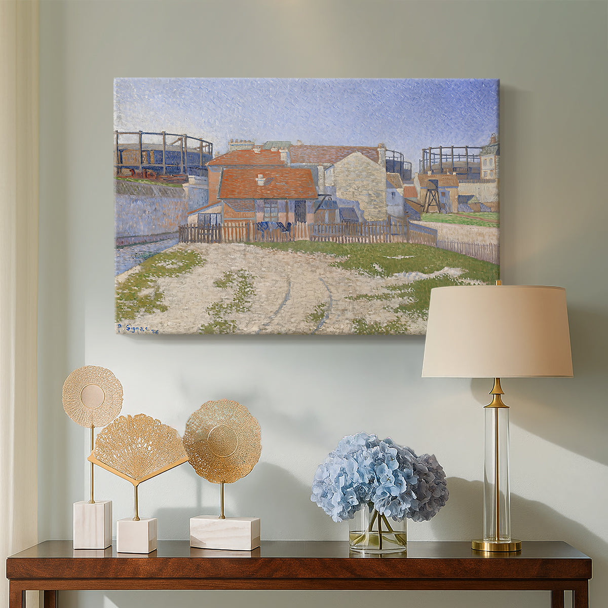 Canvas art print featuring a pointillist industrial view, displayed above a styled console table
