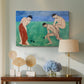 Canvas art print featuring a stylized figures interacting in a bright open field, displayed above a styled console table
