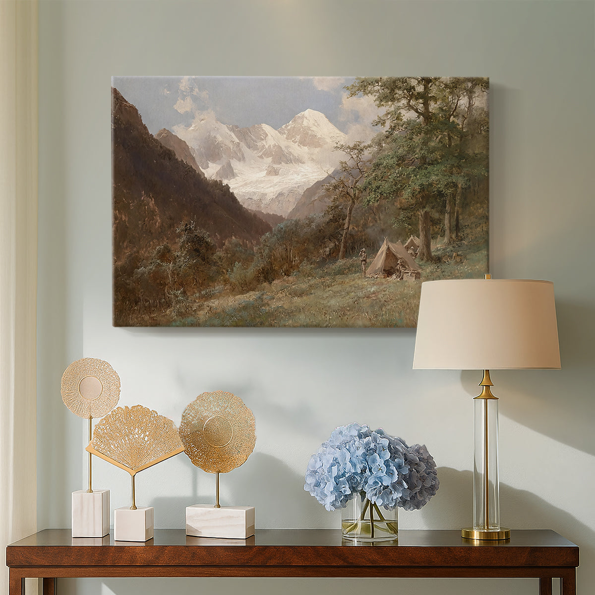 Canvas art print featuring a natural scene with valleys and rocky formations, displayed above a styled console table