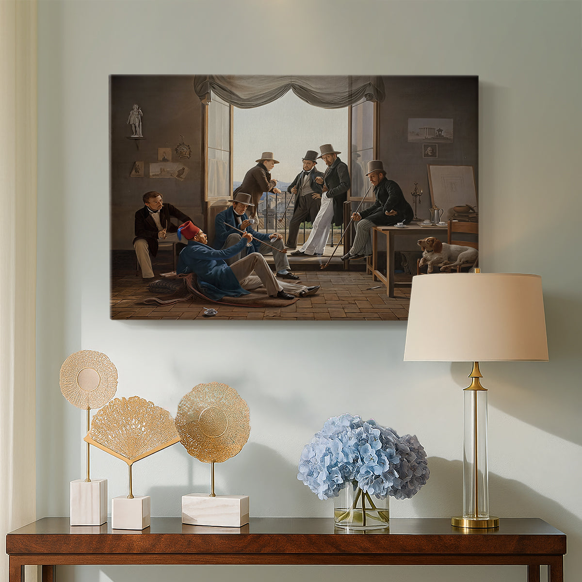 Canvas art print featuring a portrait of artists seated and standing together in interior spac, displayed above a styled console table