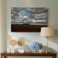 Canvas art print featuring an expansive countryside with cloud cover, displayed above a styled console table