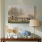 Canvas art print featuring a soft landscape with animals and reflective ground, displayed above a styled console table