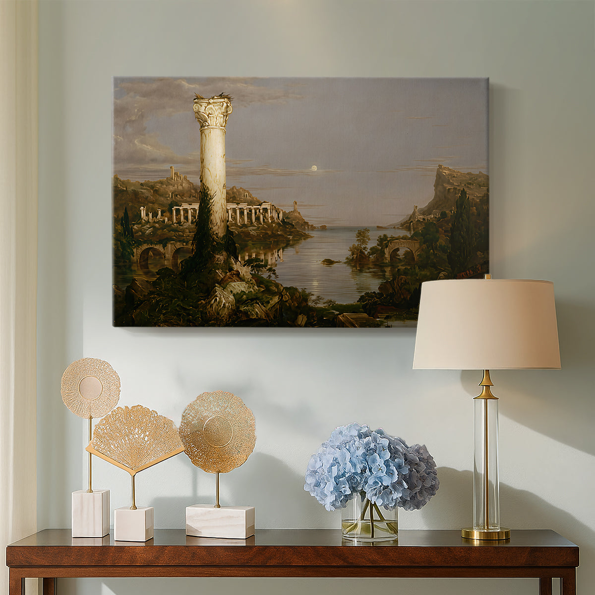 Canvas art print featuring a peaceful yet somber scene of decay and silence, displayed above a styled console table