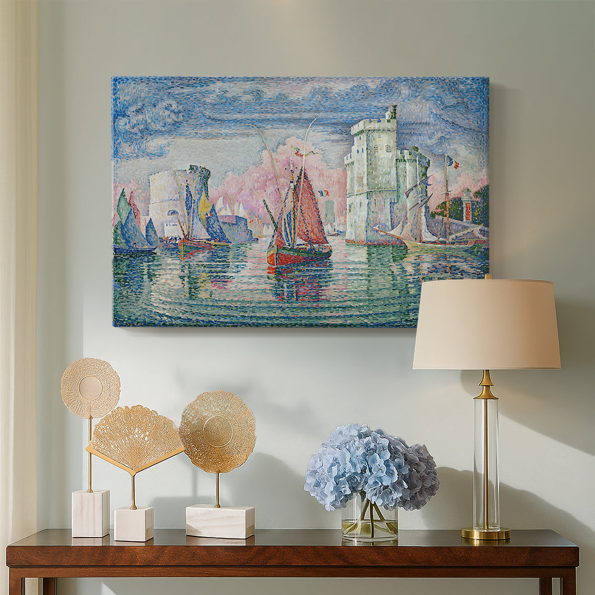 Canvas art print featuring a pointillist waterfront composition, displayed above a styled console table