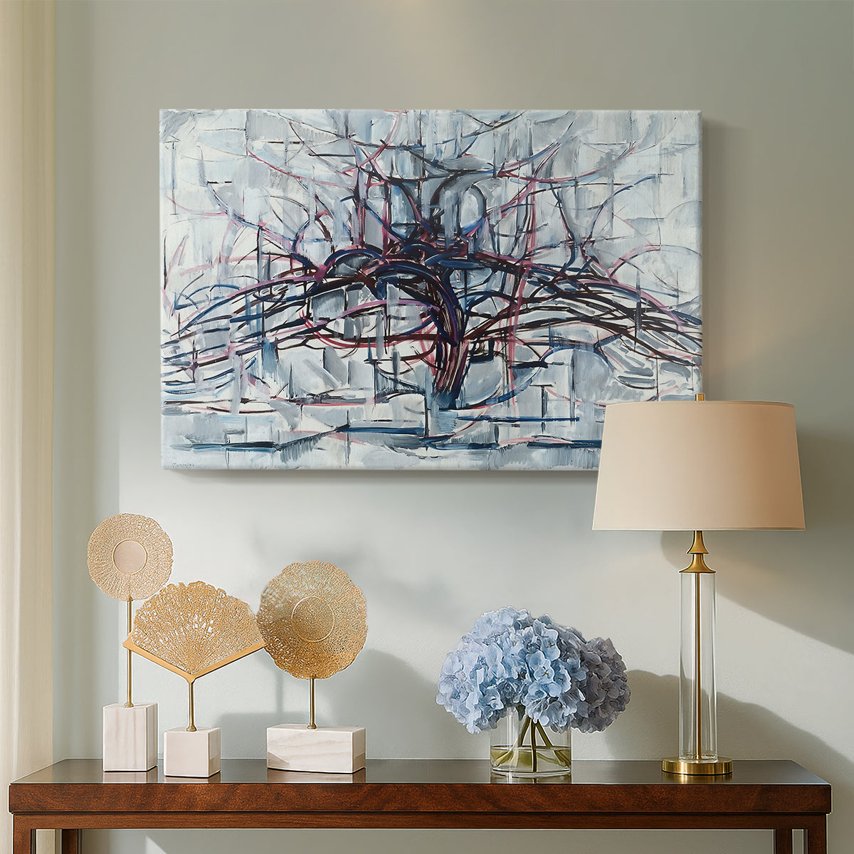 Canvas art print featuring a stylized linear tree, displayed above a styled console table