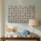 Canvas art print featuring a patterned textile featuring repeated flowers and leaves, displayed above a styled console table