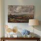 Canvas art print featuring an atmospheric countryside view, displayed above a styled console table