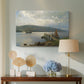 Canvas art print featuring a tranquil harbor view with dock and reflections, displayed above a styled console table