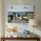 Canvas art print featuring a vibrant garden scene with colorful blooms and distant sea, displayed above a styled console table
