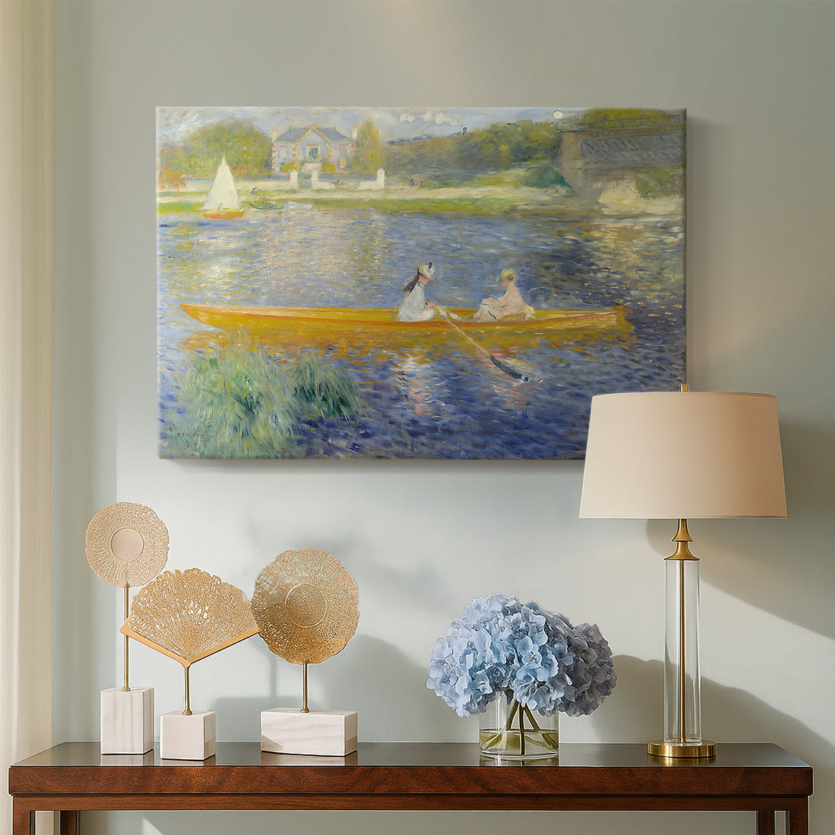 Canvas art print featuring a couple seated in boat on river surrounded by soft reflections, displayed above a styled console table