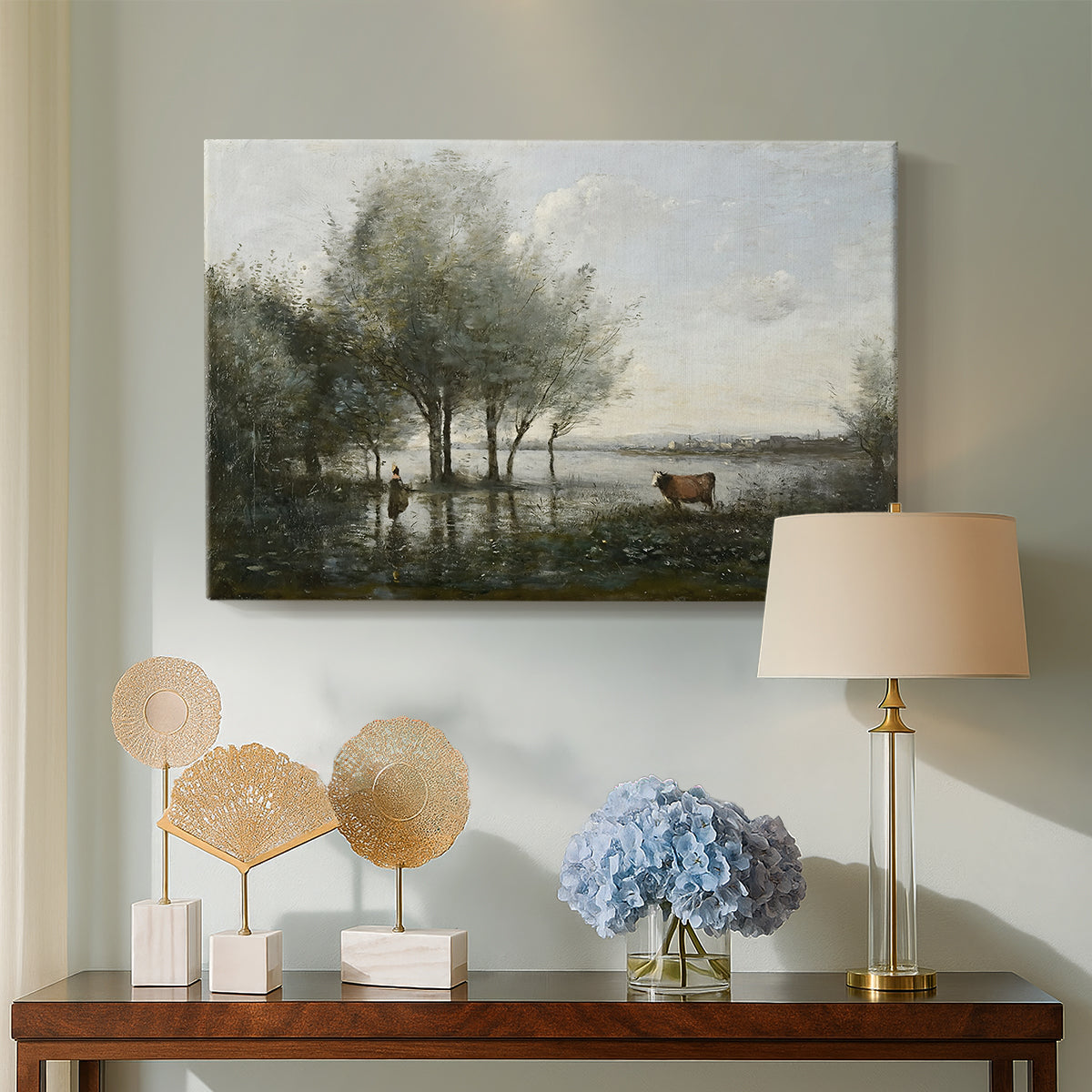 Canvas art print featuring a muted landscape with waterlogged terrain and trees, displayed above a styled console table
