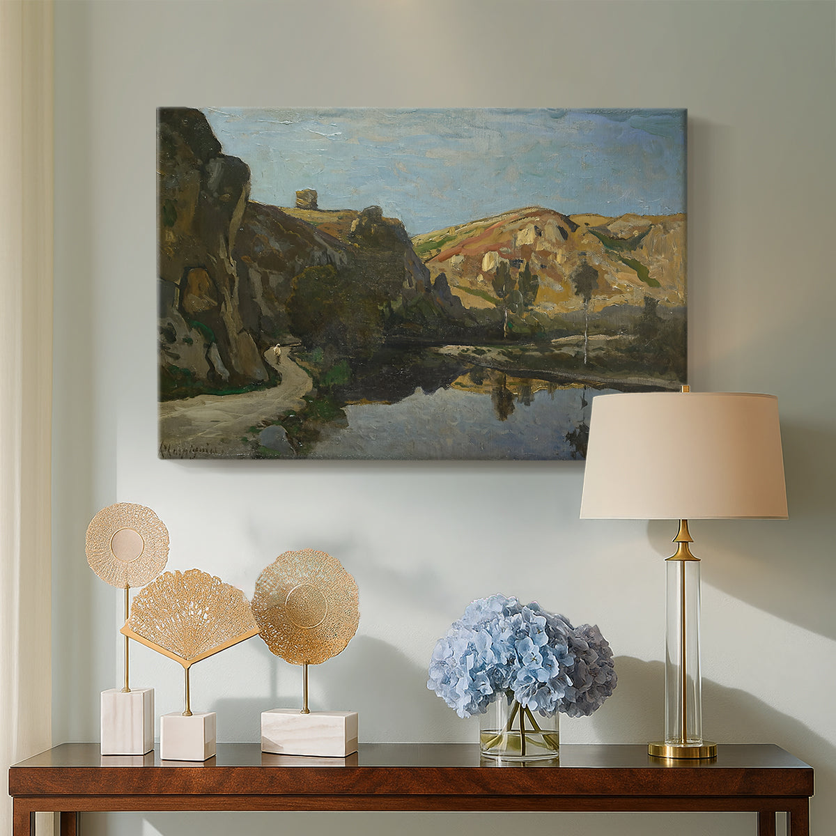 Canvas art print featuring a scenic river view bordered by cliffs and vegetation, displayed above a styled console table