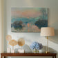 Canvas art print featuring an impressionist view of river at sunset with snowy banks, displayed above a styled console table