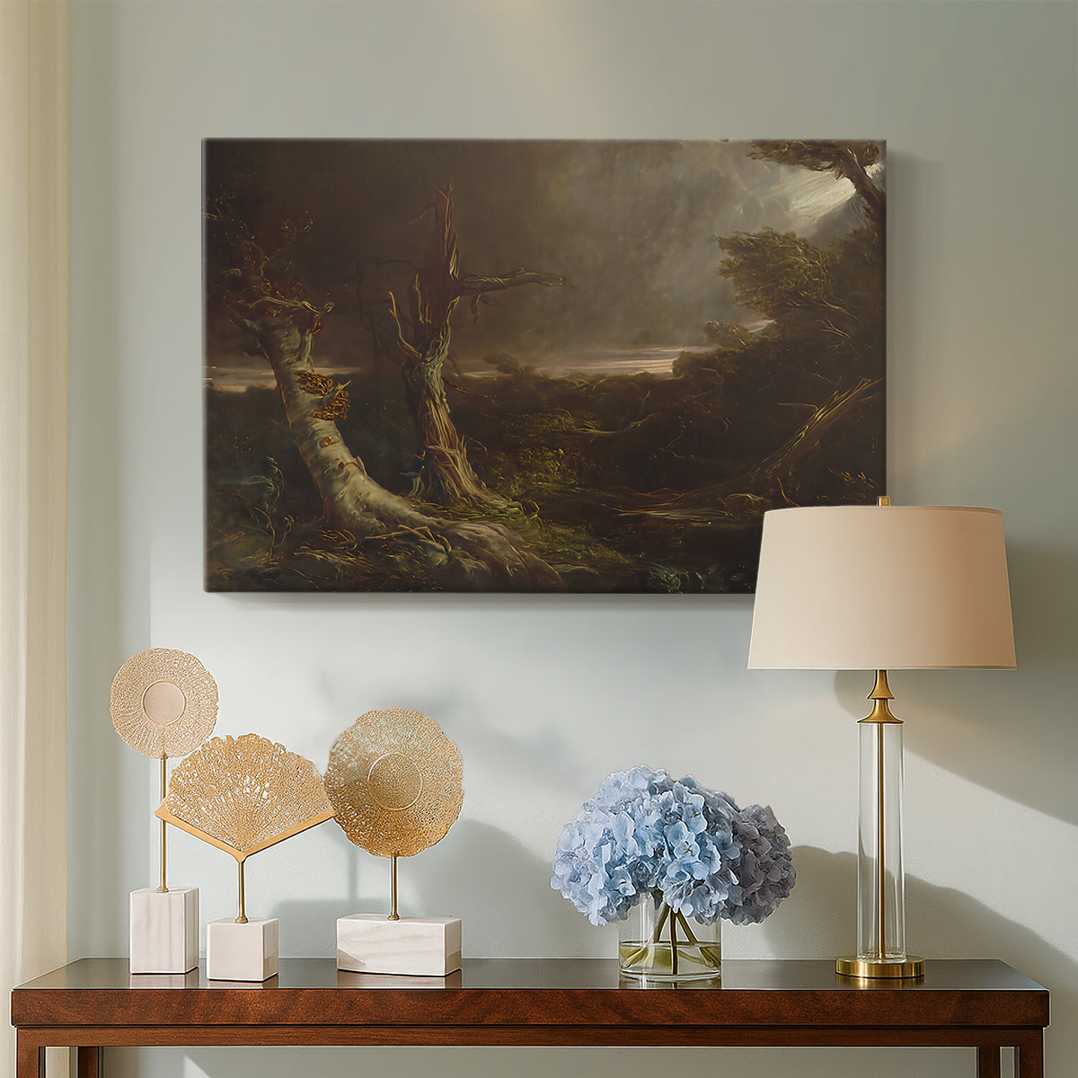 Canvas art print featuring an expressive composition showing destruction in wilderness, displayed above a styled console table