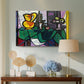 Canvas art print featuring an expressive arrangement with bold shapes, displayed above a styled console table
