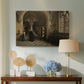 Canvas art print featuring a composition showing scale of church with people below, displayed above a styled console table