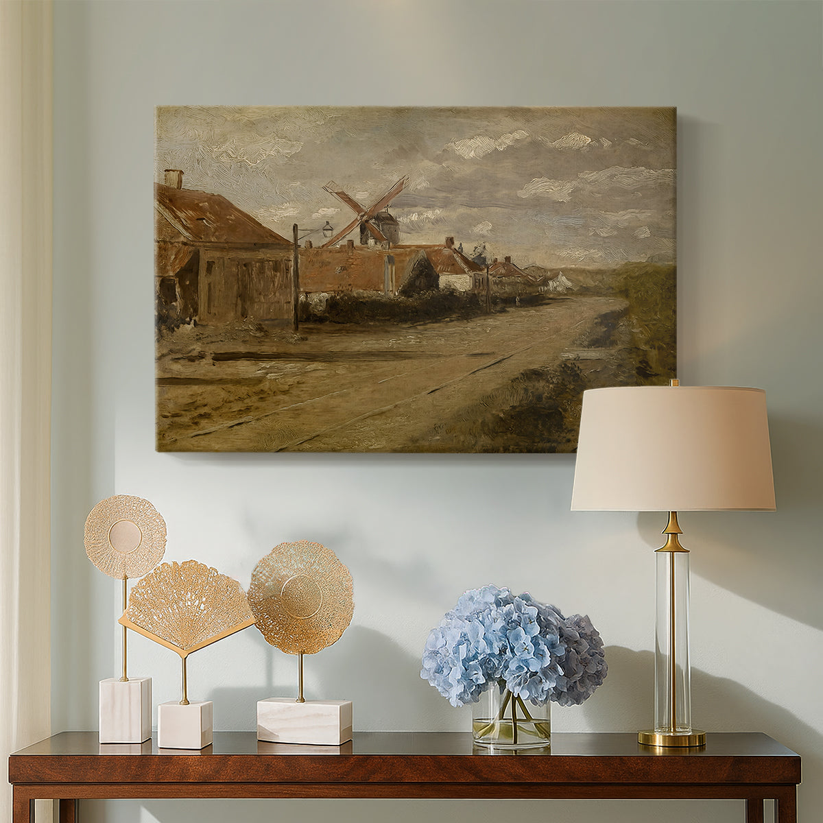 Canvas art print featuring a countryside setting with water and industrial building, displayed above a styled console table