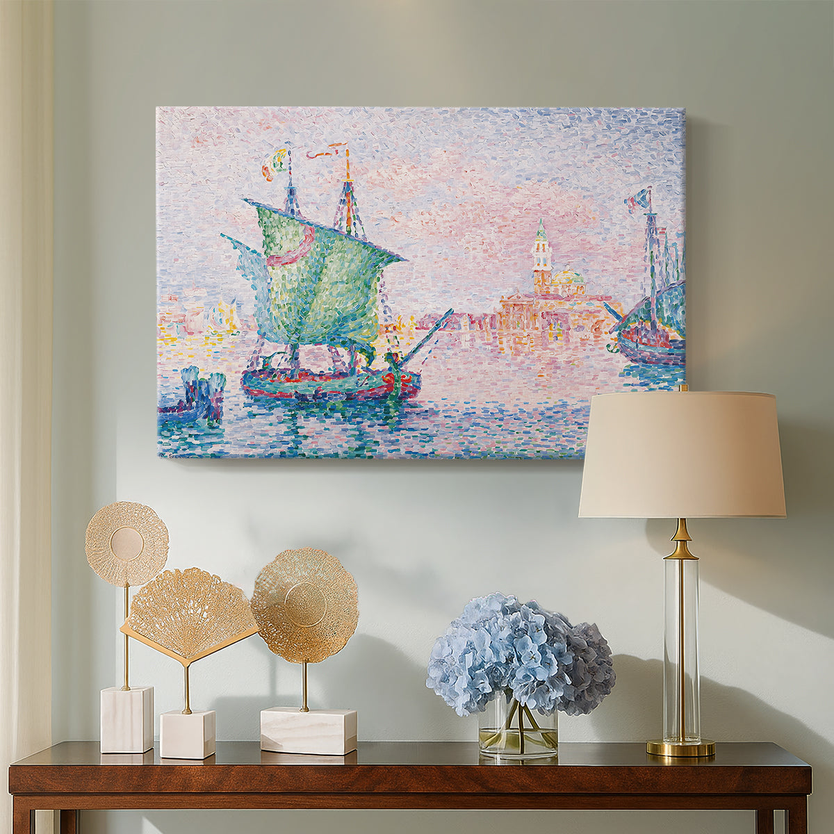 Canvas art print featuring a pointillist Venice view, displayed above a styled console table