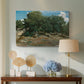 Canvas art print featuring a natural setting with detailed tree forms and soft atmosphere, displayed above a styled console table