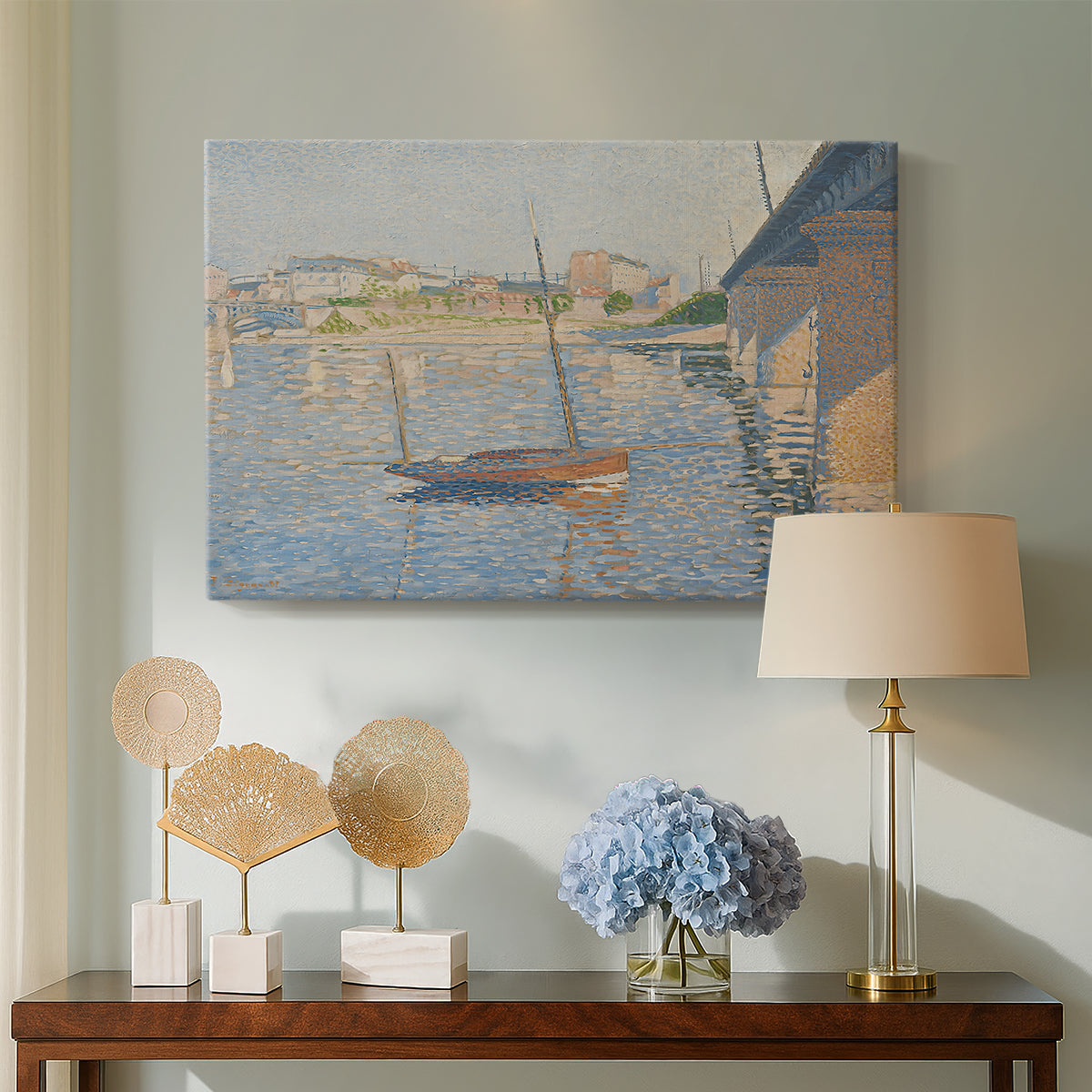 Canvas art print featuring a pointillist harbor view, displayed above a styled console table