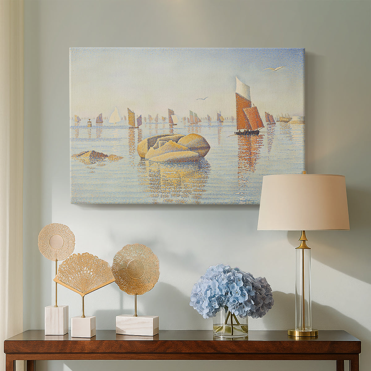 Canvas art print featuring a pointillist harbor at dawn, displayed above a styled console table