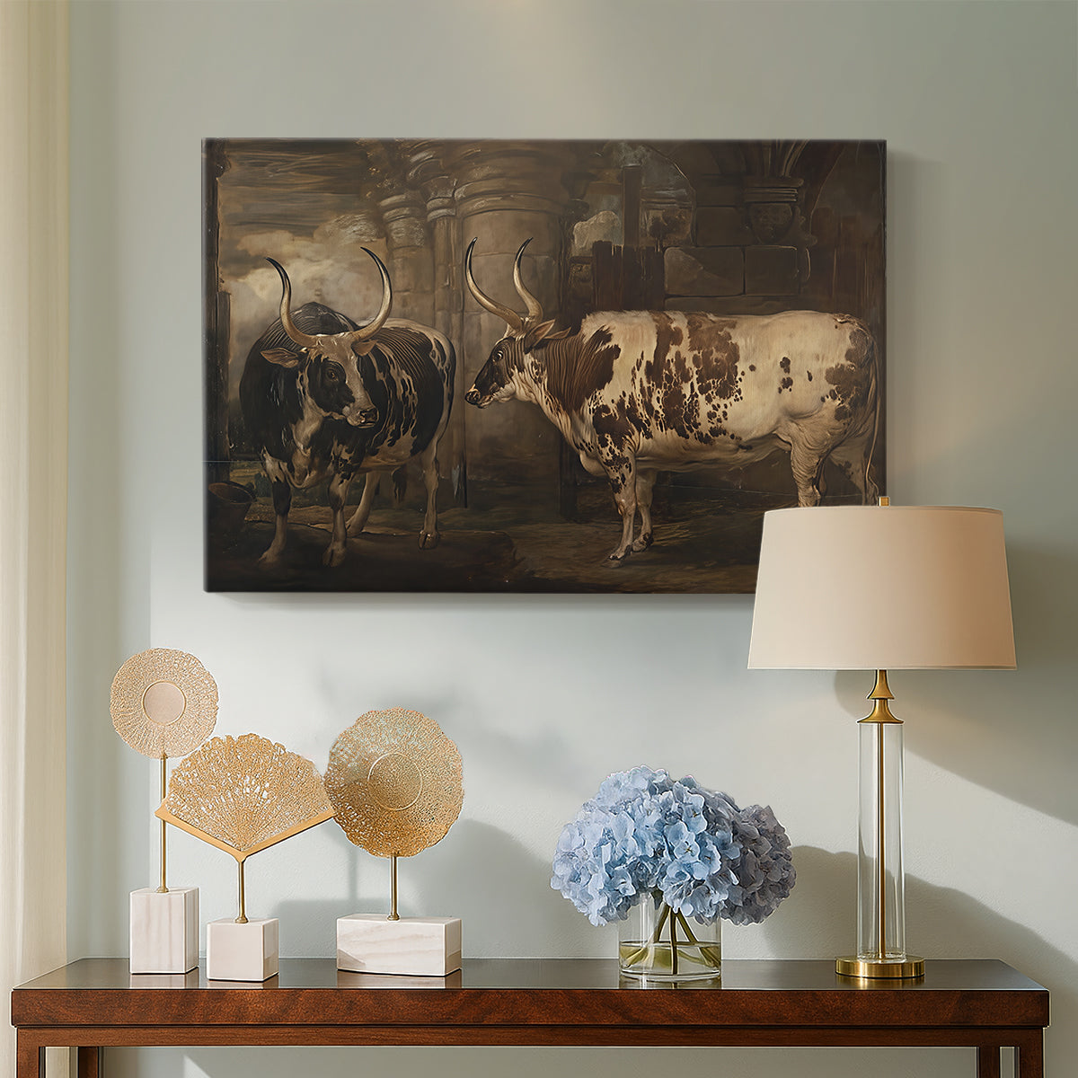 Canvas art print featuring a realistic depiction of cattle in countryside setting, displayed above a styled console table