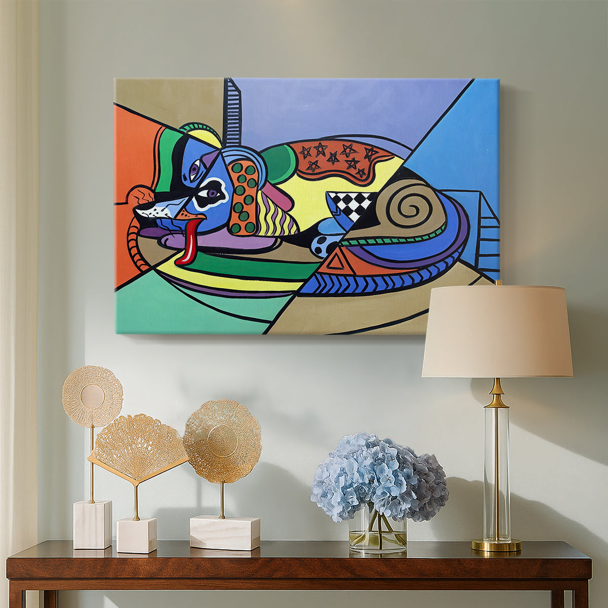 Canvas art print featuring an abstract dog with color blocks, displayed above a styled console table