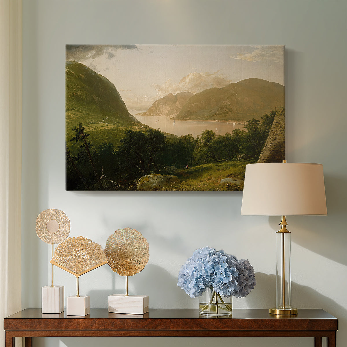 Canvas art print featuring a tranquil natural setting with river and horizon, displayed above a styled console table